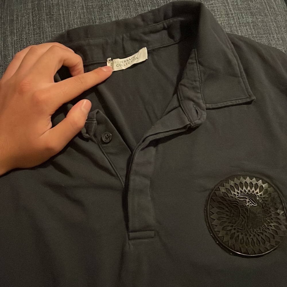 Versace black polo shirt for men. Great condition